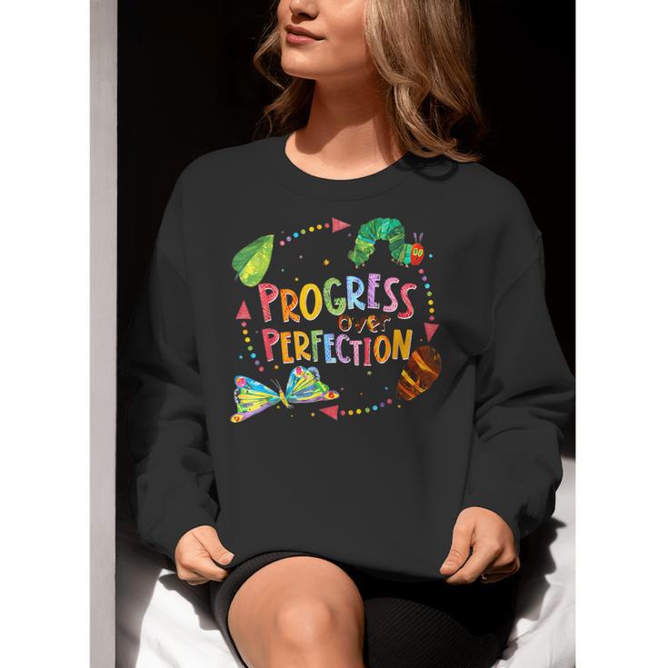 Progress Over Perfection Caterpillar Teacher Back To School Women Crewneck Sweatshirt, funny gift Progress Over Perfection Caterpillar Teacher Back To School Women Crewneck Sweatshirt, funny gift