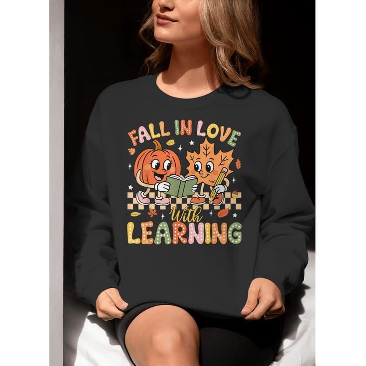 Retro Fall In Love With Learning Autumn Pumpkin Teacher Kids Women Crewneck Sweatshirt, funny gift Retro Fall In Love With Learning Autumn Pumpkin Teacher Kids Women Crewneck Sweatshirt, funny gift