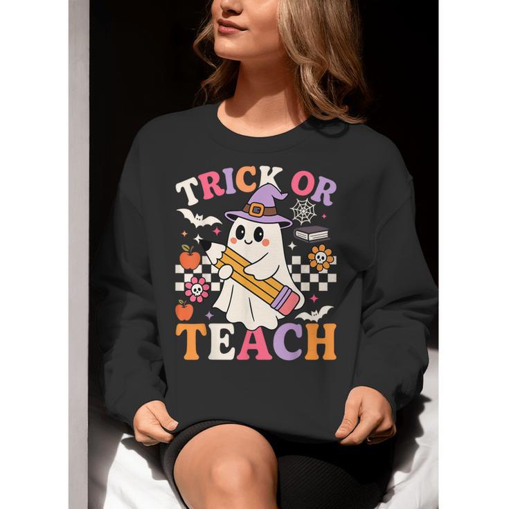Retro Floral Ghost Trick Or Teach Groovy Teacher Halloween Women Crewneck Sweatshirt, Groovy Teacher Sweatshirts, funny gift Retro Floral Ghost Trick Or Teach Groovy Teacher Halloween Women Crewneck Sweatshirt, Groovy Teacher Sweatshirts, funny gift