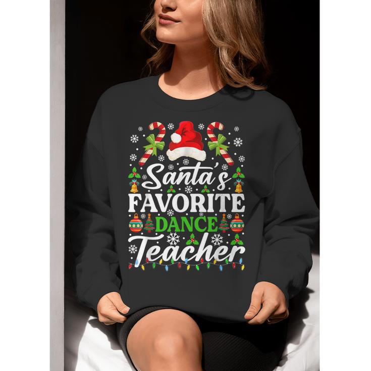 Santa's Favorite Dance Teacher Shirt Christmas Pajama Women Crewneck Sweatshirt, funny gift Santa's Favorite Dance Teacher Shirt Christmas Pajama Women Crewneck Sweatshirt, funny gift