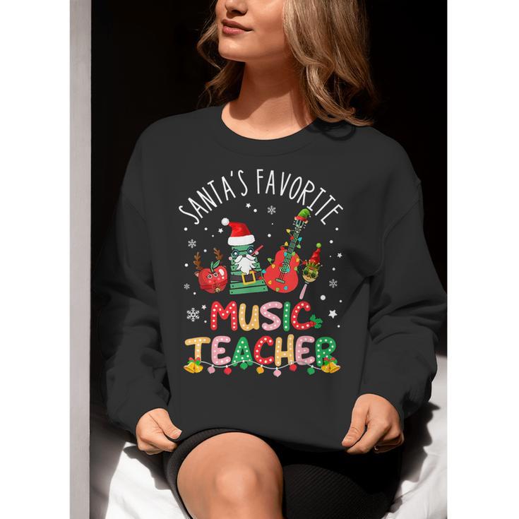 Santa's Favorite Music Teacher Christmas Santa Hat Matching Women Crewneck Sweatshirt, funny gift Santa's Favorite Music Teacher Christmas Santa Hat Matching Women Crewneck Sweatshirt, funny gift