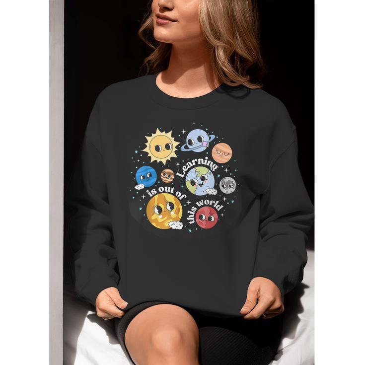 Solar System Learning Is Out Of This World Science Teacher Women Crewneck Sweatshirt, Science Teacher Sweatshirts, funny gift