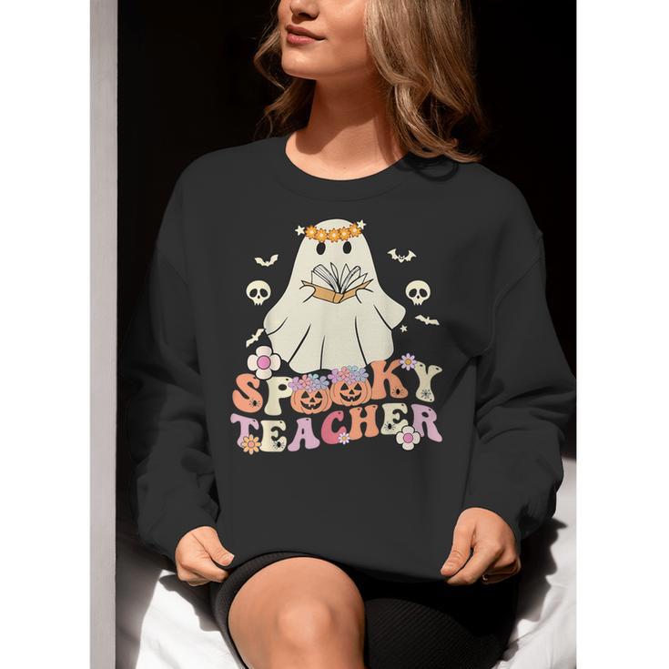 Spooky Teacher Groovy Retro Ghost Teacher Halloween 2023 For Men Women Kids Women Crewneck Sweatshirt, Groovy Teacher Sweatshirts, funny gift