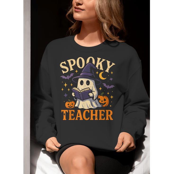 Spooky Teacher Halloween Cute Ghost Pumpkin Reading Women Women Crewneck Sweatshirt, funny gift