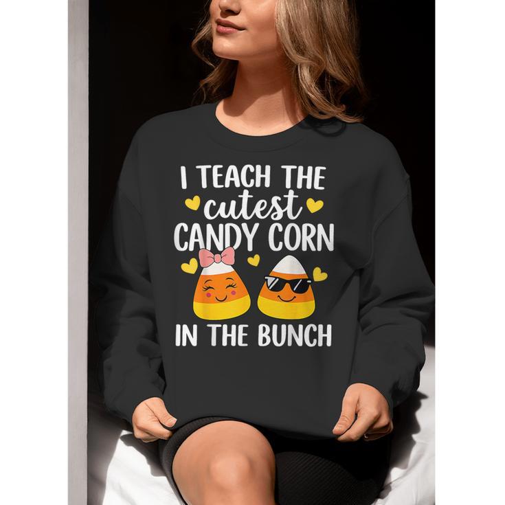 I Teach The Cutest Candy Corn In The Bunch Teacher Halloween Women Crewneck Sweatshirt, funny gift I Teach The Cutest Candy Corn In The Bunch Teacher Halloween Women Crewneck Sweatshirt, funny gift