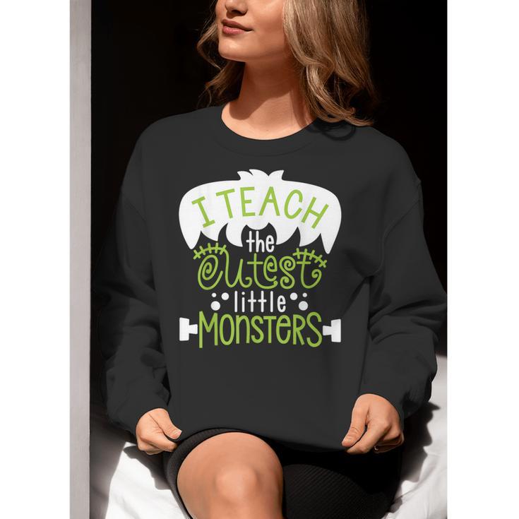 I Teach The Cutest Little Monsters Halloween Teacher Spooky Women Crewneck Sweatshirt, funny gift I Teach The Cutest Little Monsters Halloween Teacher Spooky Women Crewneck Sweatshirt, funny gift