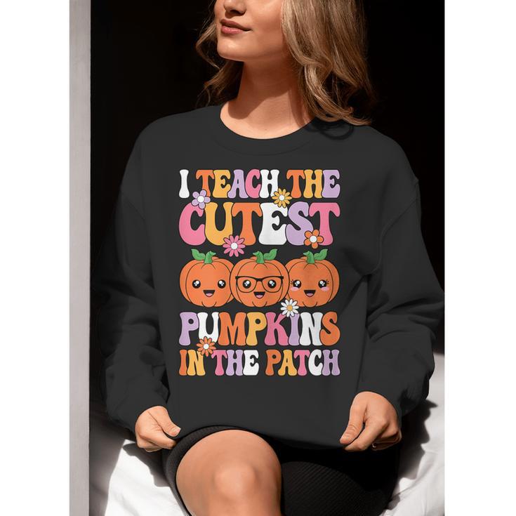 I Teach The Cutest Pumpkins Halloween Fall Teacher Women Women Crewneck Sweatshirt, funny gift I Teach The Cutest Pumpkins Halloween Fall Teacher Women Women Crewneck Sweatshirt, funny gift