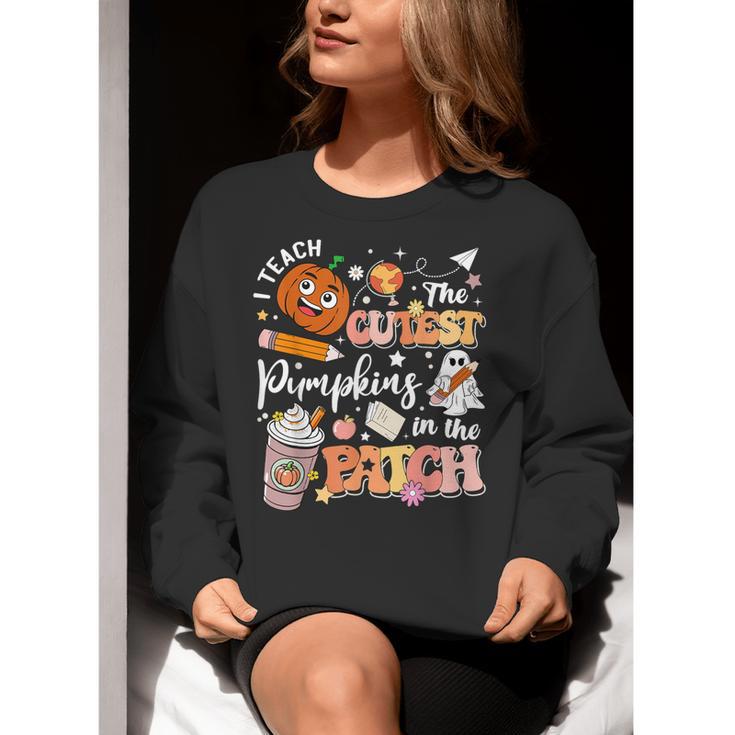I Teach The Cutest Pumpkins In The Patch Halloween Teacher Women Crewneck Sweatshirt, funny gift