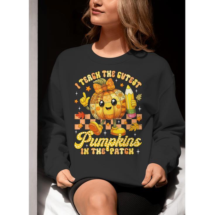 I Teach The Cutest Pumpkins In The Patch Teacher Halloween Women Crewneck Sweatshirt, funny gift I Teach The Cutest Pumpkins In The Patch Teacher Halloween Women Crewneck Sweatshirt, funny gift
