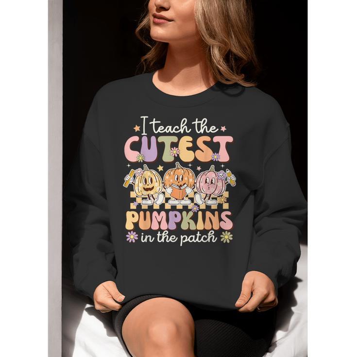 I Teach The Cutest Pumpkins In The Patch Teacher Retro Women Crewneck Sweatshirt, funny gift I Teach The Cutest Pumpkins In The Patch Teacher Retro Women Crewneck Sweatshirt, funny gift