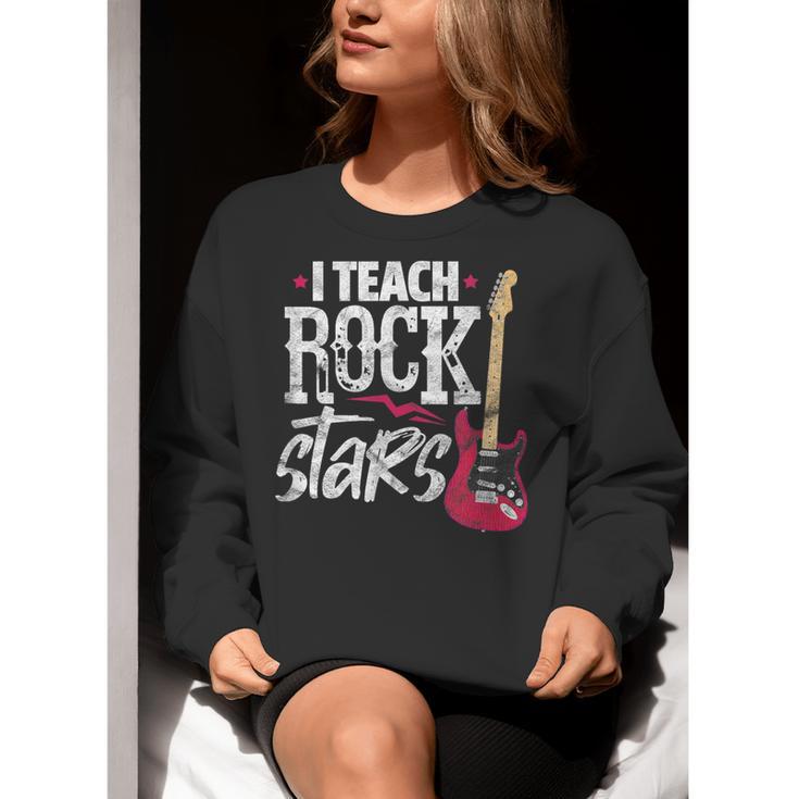 I Teach Rock Stars Music Teacher Guitar Player Women Crewneck Sweatshirt, funny gift