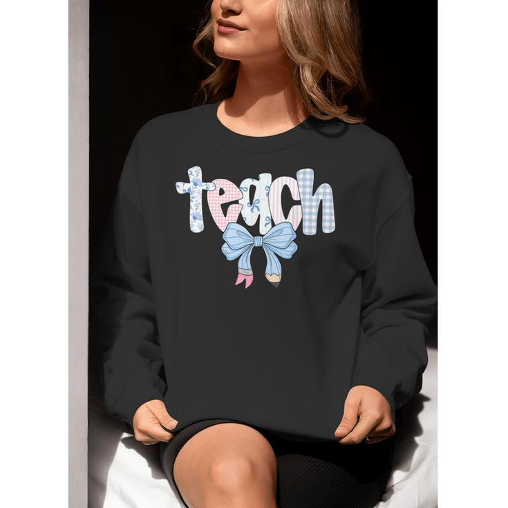 Teach Teacher Coquette Bow Pencil Back To School First Day Women Crewneck Sweatshirt, funny gift Teach Teacher Coquette Bow Pencil Back To School First Day Women Crewneck Sweatshirt, funny gift