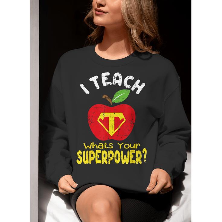 I Teach What's Your Superpower Superhero Teacher Women Crewneck Sweatshirt, funny gift