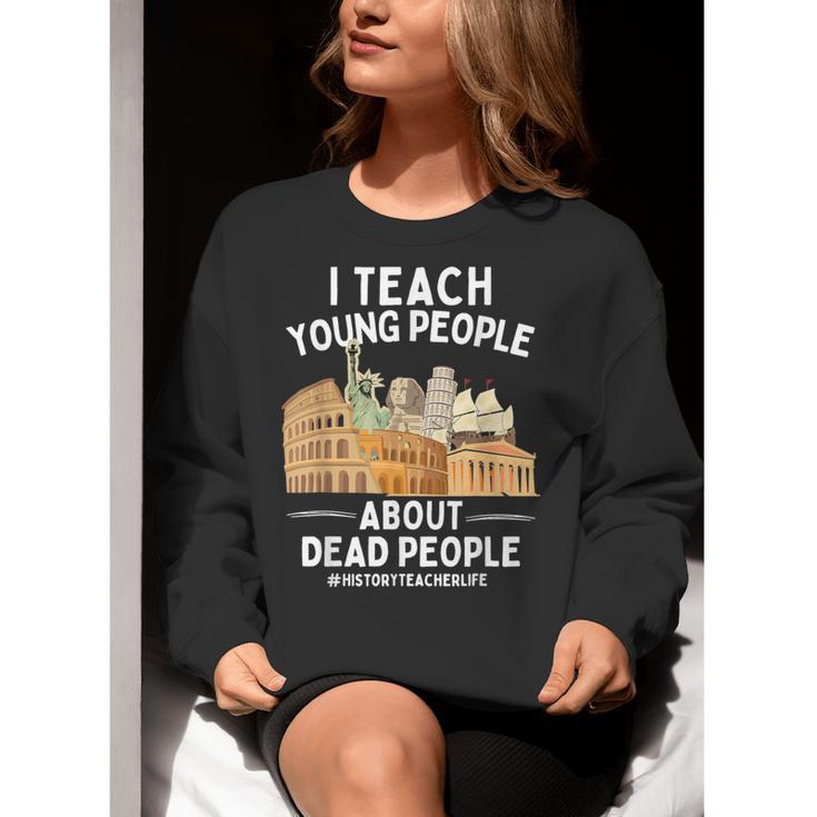 I Teach Young People About Dead People History Teachers Women Crewneck Sweatshirt, History Teacher Sweatshirts, funny gift I Teach Young People About Dead People History Teachers Women Crewneck Sweatshirt, History Teacher Sweatshirts, funny gift