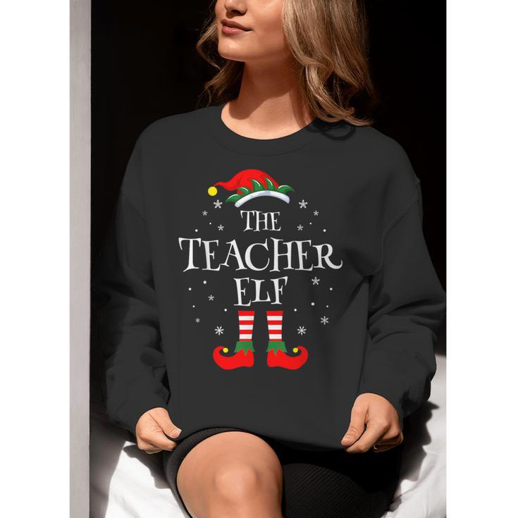 The Teacher Elf Christmas Family Matching Group Xmas Women Crewneck Sweatshirt, funny gift The Teacher Elf Christmas Family Matching Group Xmas Women Crewneck Sweatshirt, funny gift