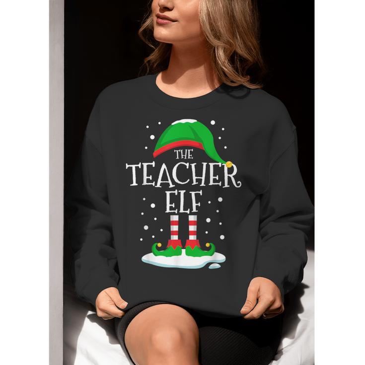 The Teacher Elf Christmas Family Matching Xmas Group For Men Women Women Crewneck Sweatshirt, funny gift The Teacher Elf Christmas Family Matching Xmas Group For Men Women Women Crewneck Sweatshirt, funny gift