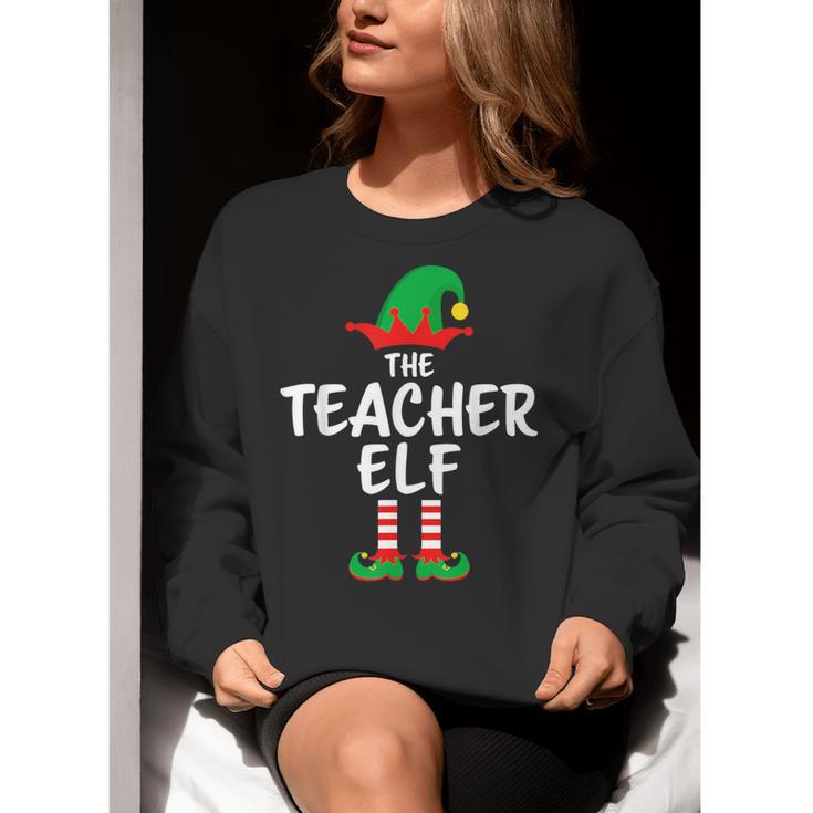 The Teacher Elf Matching Family Christmas Women Crewneck Sweatshirt, funny gift The Teacher Elf Matching Family Christmas Women Crewneck Sweatshirt, funny gift