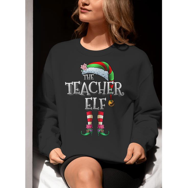 The Teacher Elf Shirt Matching Family Christmas Elf Men Women Kids Women Crewneck Sweatshirt, funny gift The Teacher Elf Shirt Matching Family Christmas Elf Men Women Kids Women Crewneck Sweatshirt, funny gift