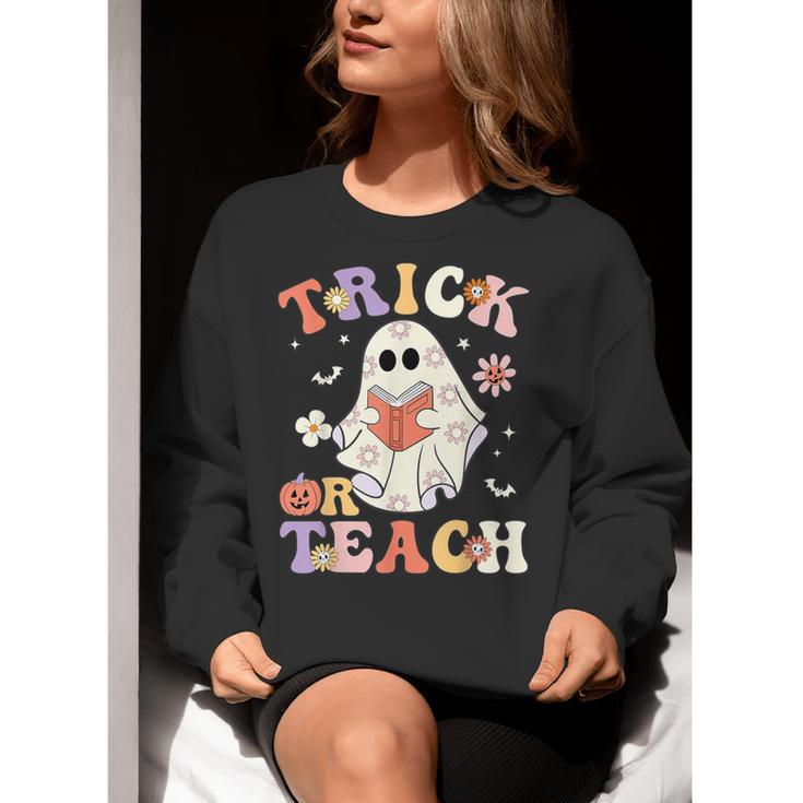 Teacher Halloween Trick Or Teach Floral Ghost Women Crewneck Sweatshirt, funny gift Teacher Halloween Trick Or Teach Floral Ghost Women Crewneck Sweatshirt, funny gift