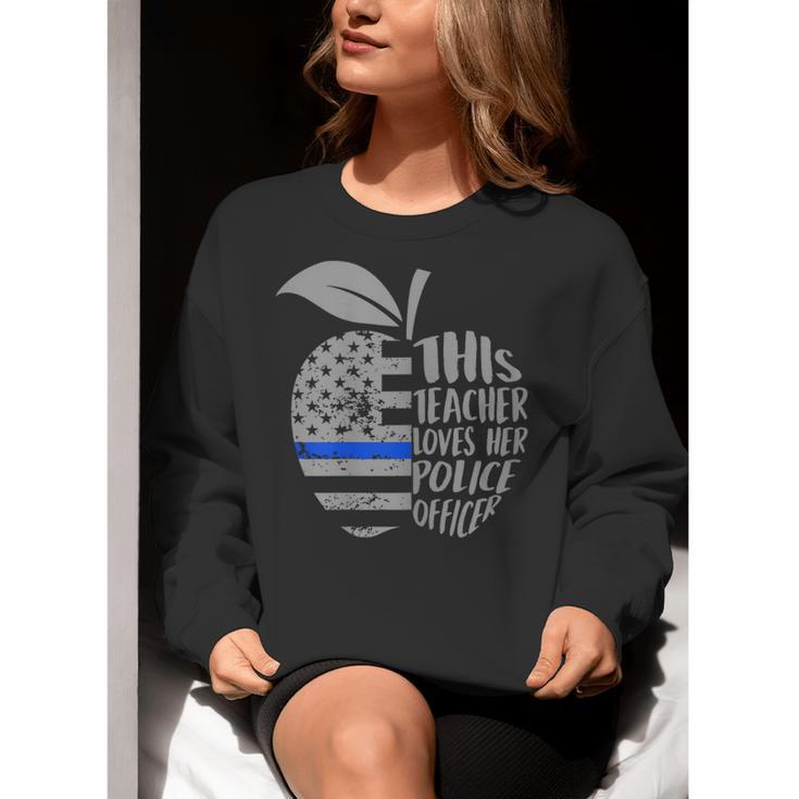 This Teacher Loves Her Police Officer Wife Saying Women Crewneck Sweatshirt, funny gift