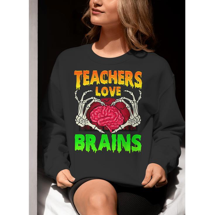 Teacher Teachers Love Brains Skeleton Hand Heart Halloween Women Crewneck Sweatshirt, funny gift Teacher Teachers Love Brains Skeleton Hand Heart Halloween Women Crewneck Sweatshirt, funny gift