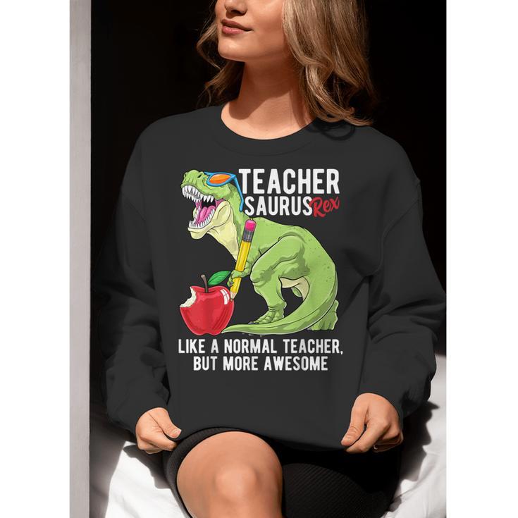 Teachersaurus Rex Dinosaur Like A Normal Teacher Saurus Women Crewneck Sweatshirt, funny gift Teachersaurus Rex Dinosaur Like A Normal Teacher Saurus Women Crewneck Sweatshirt, funny gift