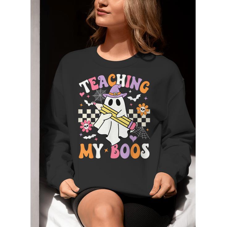 Teaching My Boos Ghost Teacher Cute Groovy Halloween Teacher Women Crewneck Sweatshirt, Groovy Teacher Sweatshirts, funny gift Teaching My Boos Ghost Teacher Cute Groovy Halloween Teacher Women Crewneck Sweatshirt, Groovy Teacher Sweatshirts, funny gift