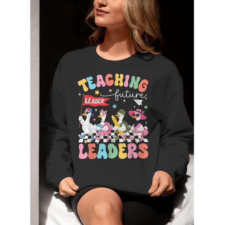 Teaching Future Leaders Groovy Teacher Back To School Women Crewneck Sweatshirt, Future Teacher Sweatshirts, Groovy Teacher Sweatshirts, funny gift Teaching Future Leaders Groovy Teacher Back To School Women Crewneck Sweatshirt, Future Teacher Sweatshirts, Groovy Teacher Sweatshirts, funny gift