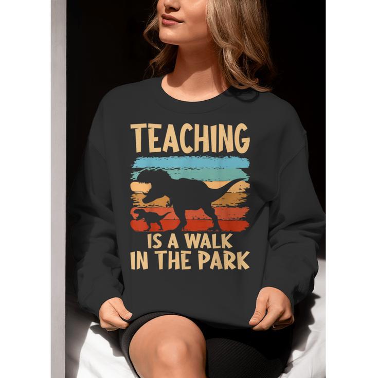 Teaching Is a Walk In Park Dinosaur Teacher Women Crewneck Sweatshirt, funny gift