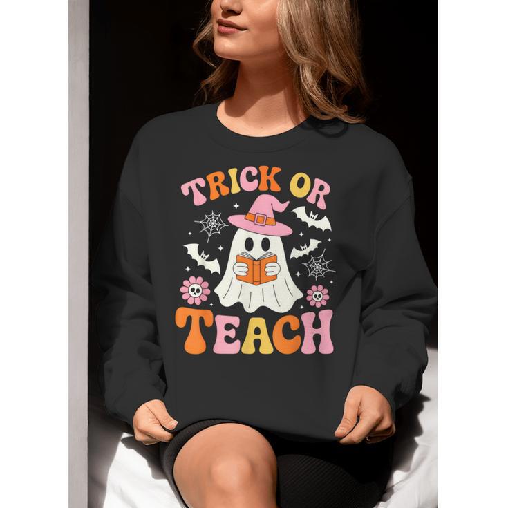 Trick Or Teach Cute Floral Ghost Teacher Halloween Costume Women Crewneck Sweatshirt, funny gift