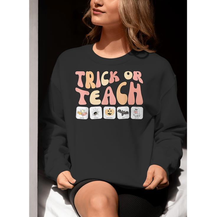 Trick Or Teach With Symbols Special Education Teacher Spooky Women Crewneck Sweatshirt, funny gift
