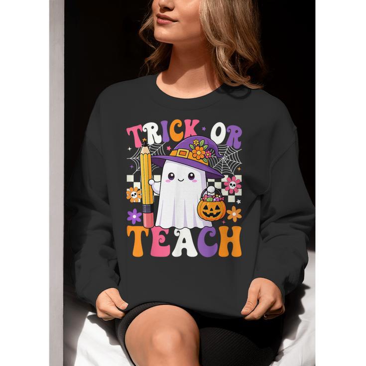 Trick Or Teach Teacher Pencil Ghost Halloween Teacher Women Crewneck Sweatshirt, funny gift Trick Or Teach Teacher Pencil Ghost Halloween Teacher Women Crewneck Sweatshirt, funny gift