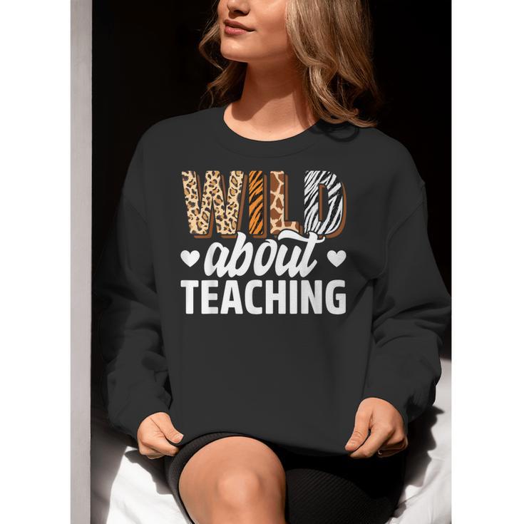 Wild About Teaching Teacher Teaching Back To School Women Crewneck Sweatshirt, funny gift
