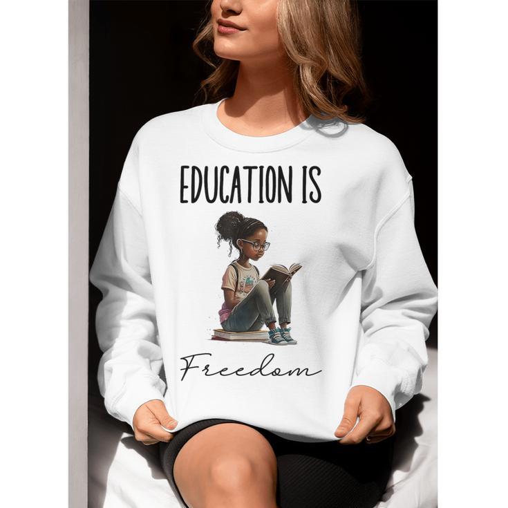 Education Is Freedom Teacher Books Black History Month Women Crewneck Sweatshirt, History Teacher Sweatshirts, funny gift