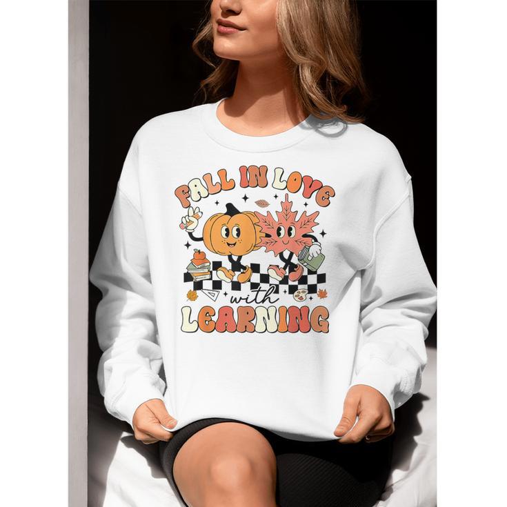 Fall In Love With Learning Teacher Retro Thanksgiving Women Crewneck Sweatshirt, funny gift Fall In Love With Learning Teacher Retro Thanksgiving Women Crewneck Sweatshirt, funny gift