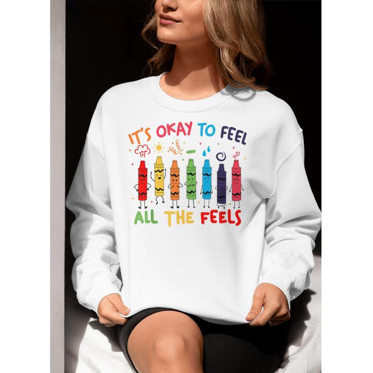 Its Okay To Feel All The Feels Mood Color Crayons Teacher Women Crewneck Sweatshirt, funny gift