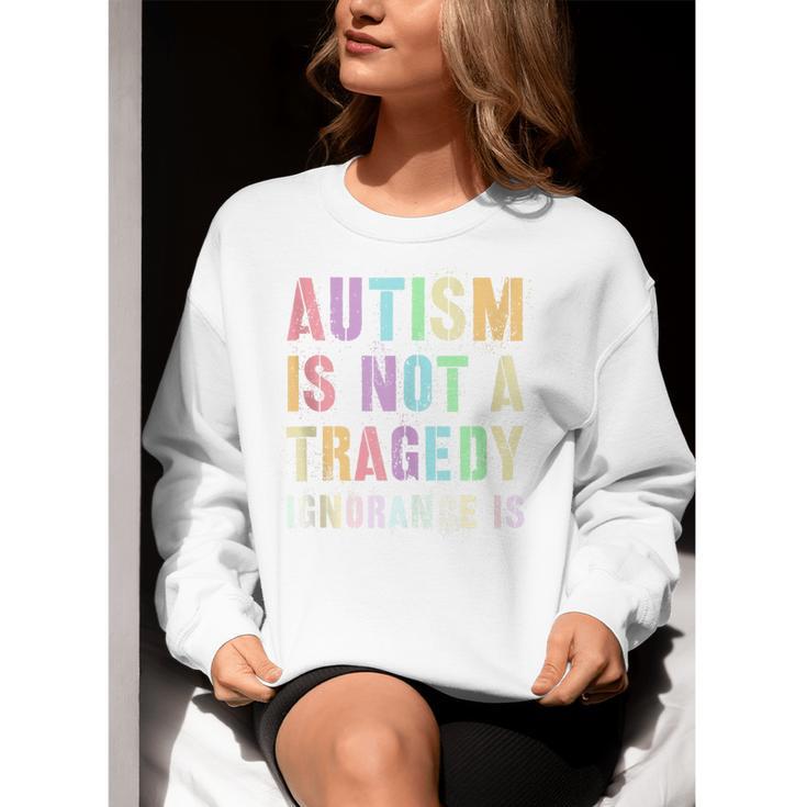 Kids AUTISM IS NOT A TRAGEDY IGNORANCE IS Proud Teacher Crew Women Crewneck Sweatshirt, funny gift Kids AUTISM IS NOT A TRAGEDY IGNORANCE IS Proud Teacher Crew Women Crewneck Sweatshirt, funny gift