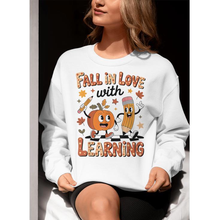 Retro Fall In Love With Learning Autumn Pumpkin Teacher Kids Women Crewneck Sweatshirt, funny gift Retro Fall In Love With Learning Autumn Pumpkin Teacher Kids Women Crewneck Sweatshirt, funny gift