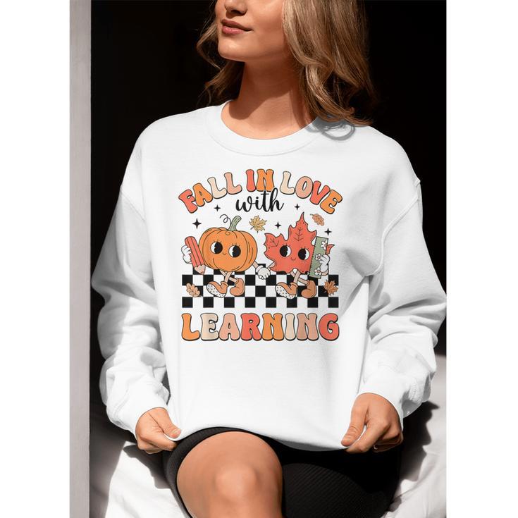Retro Fall In Love With Learning Autumn Pumpkin Teacher Women Crewneck Sweatshirt, funny gift Retro Fall In Love With Learning Autumn Pumpkin Teacher Women Crewneck Sweatshirt, funny gift