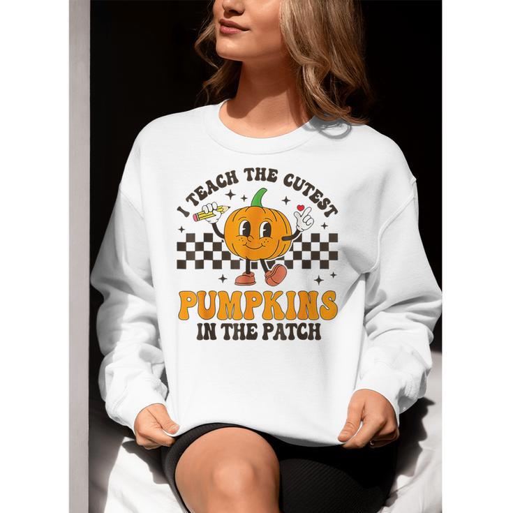 I Teach The Cutest Pumpkins In The Patch Groovy Teacher Fall Women Crewneck Sweatshirt, Groovy Teacher Sweatshirts, funny gift