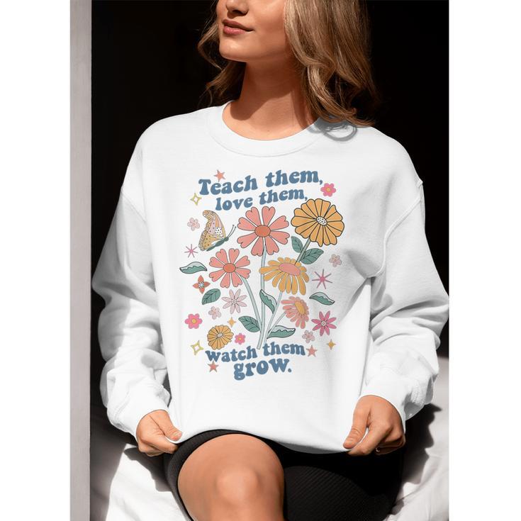 Teach Them Love Them Watch Them Grow Retro Teacher Floral Women Crewneck Sweatshirt, funny gift