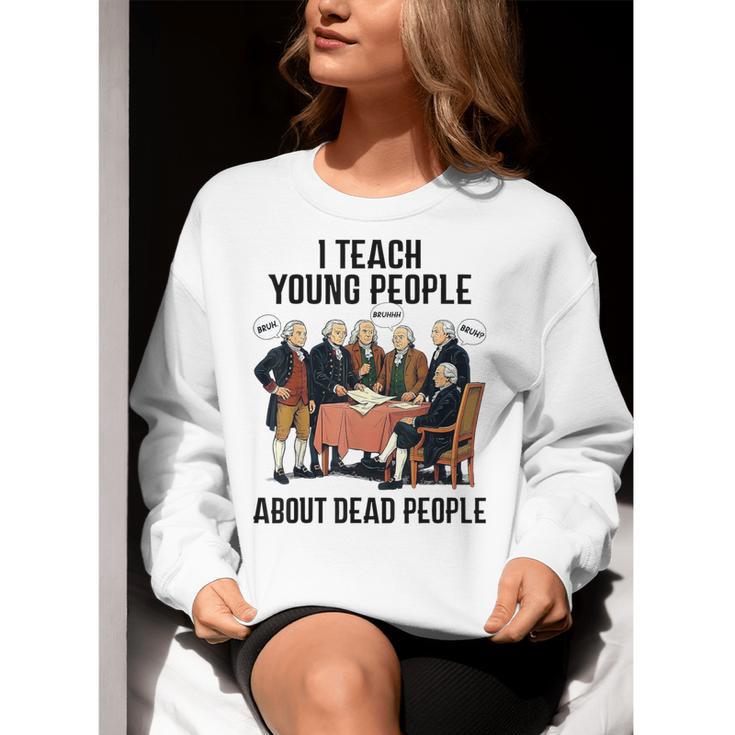 I Teach Young People About Dead-People History Teachers Women Crewneck Sweatshirt, History Teacher Sweatshirts, funny gift I Teach Young People About Dead-People History Teachers Women Crewneck Sweatshirt, History Teacher Sweatshirts, funny gift