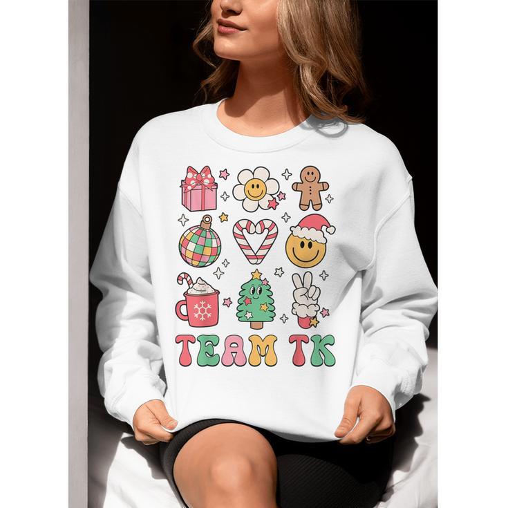 Team TK Teacher Christmas Groovy Smile Face Girl Boy Kid TK Women Crewneck Sweatshirt, Groovy Teacher Sweatshirts, funny gift Team TK Teacher Christmas Groovy Smile Face Girl Boy Kid TK Women Crewneck Sweatshirt, Groovy Teacher Sweatshirts, funny gift