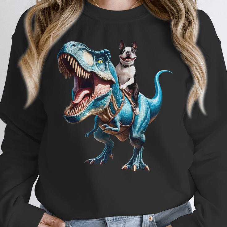 Boston Terrier Riding T-Rex Dinosaur Dog Lover Women Crewneck Sweatshirt, Boston Terrier Riding Gifts, funny design