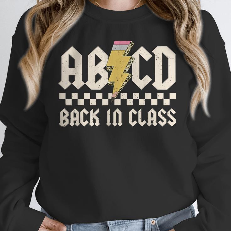 Boys Girls Teachers Rock Back To School ABCD Back In Class Women Crewneck Sweatshirt, funny design Boys Girls Teachers Rock Back To School ABCD Back In Class Women Crewneck Sweatshirt, funny design