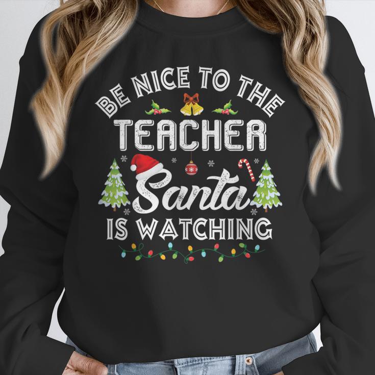 Christmas Be Nice To The Teacher Santa Is Watching Xmas Women Crewneck Sweatshirt, funny design Christmas Be Nice To The Teacher Santa Is Watching Xmas Women Crewneck Sweatshirt, funny design