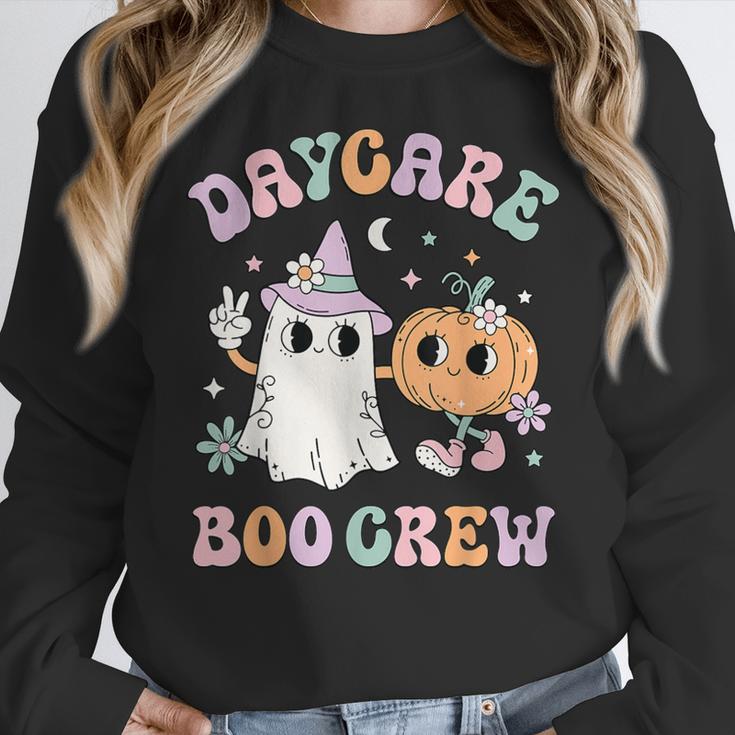 Daycare Boo Crew Groovy Halloween Floral Ghost Kid Teacher Women Crewneck Sweatshirt, Groovy Teacher Gifts, funny design