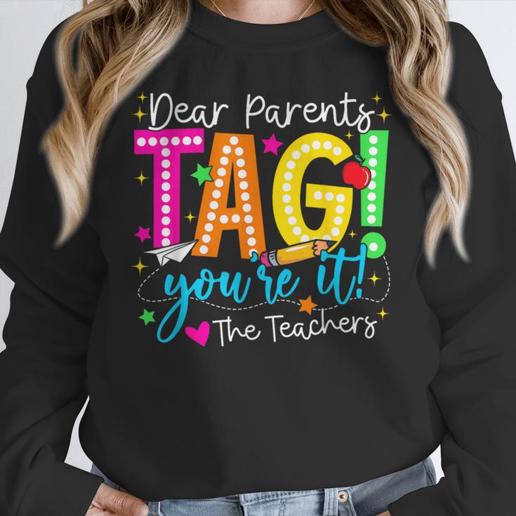 Dear Parents Tag You'Re It Love Teachers Last Day Of School Women Crewneck Sweatshirt, funny design