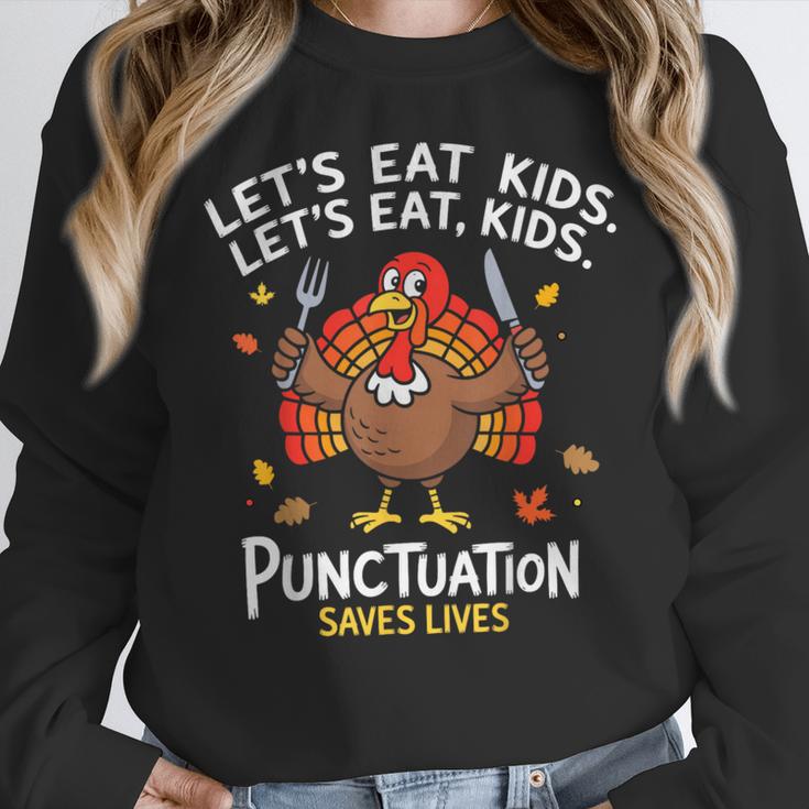Lets Eat Kids Punctuation Saves Lives Thanksgiving Teacher Women Crewneck Sweatshirt, funny design