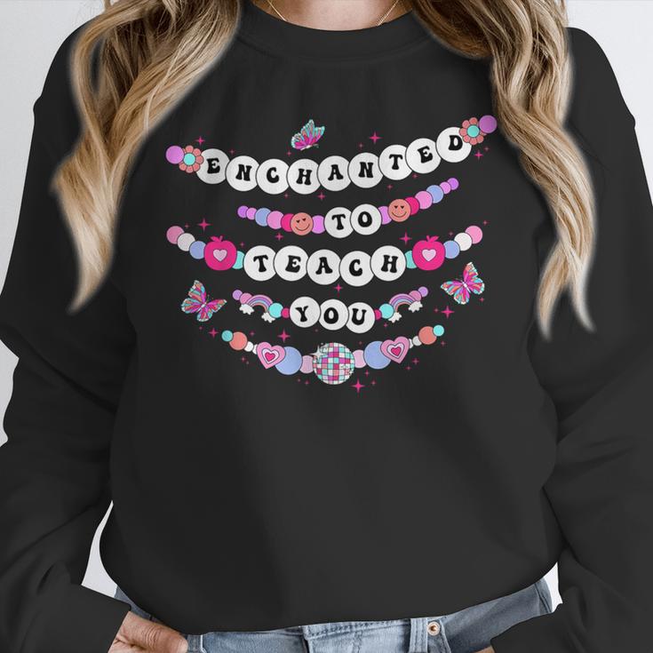 Enchanted To Teach You Bracelet Teacher Back To School Women Crewneck Sweatshirt, funny design Enchanted To Teach You Bracelet Teacher Back To School Women Crewneck Sweatshirt, funny design
